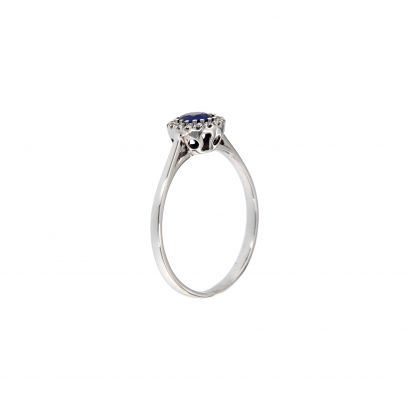 Anello in oro bianco 18kt con zaffiro blu ovale 5x4mm e diamanti G VS1