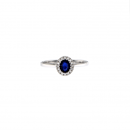 Anello in oro bianco 18kt con zaffiro blu ovale 5x4mm e diamanti G VS1